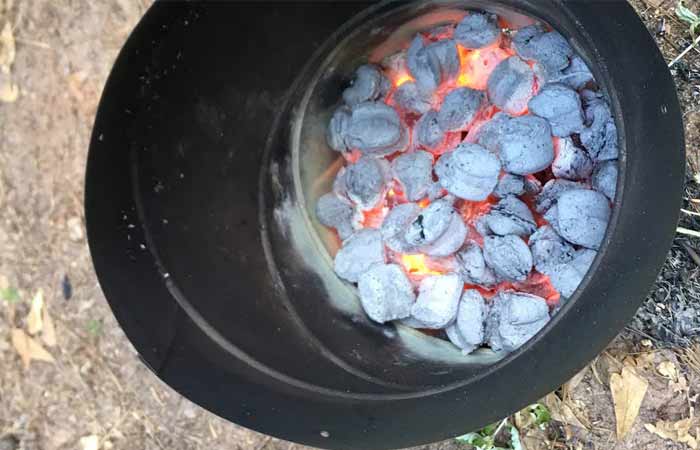 burn out tree stump with barrel