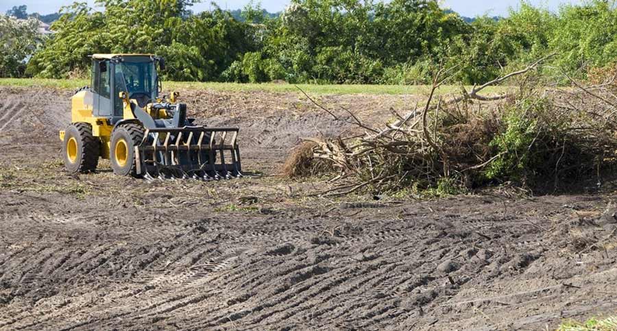 excavator used in land grubbing