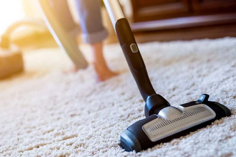 Vacuum the carpet